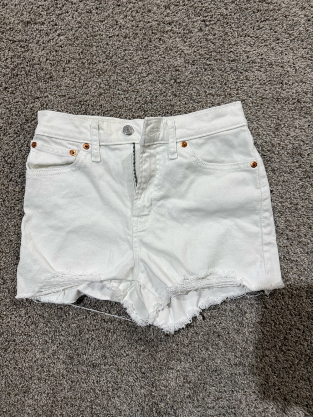Levi's White Denim Cutoff Shorts with Frayed Hem